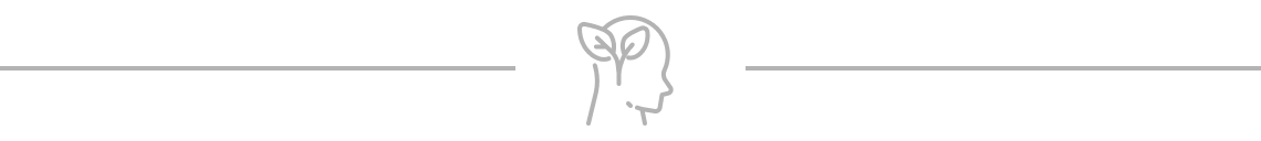 person head profile outline with plant seedling germinating inside
